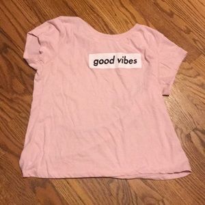 Pink good vibes tee shirt.